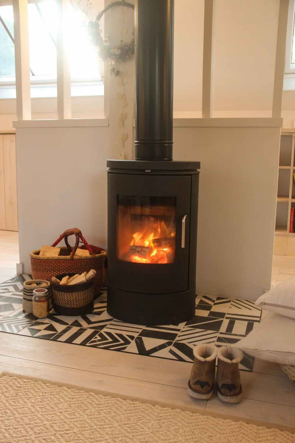 The woodburner keeps the space cosy on chilly days